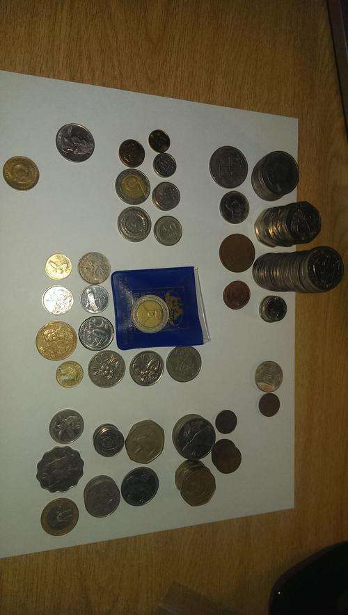 LOT OF 145 INTERNATIONAL COINS!!!! one bid takes all